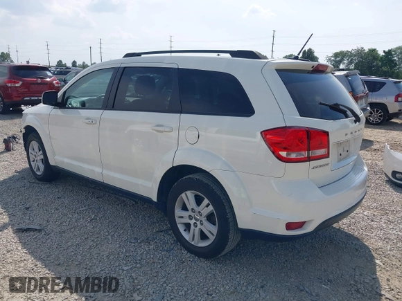 2012 Dodge Journey SXT z VIN 3C4PDCBB0CT323569, wystawiony jako IAAI lot #42748440 z przebiegiem 141 950 mil mil oraz . Historia ofert i sprzedaży dostępna na DreamBid. Obrazek 3.