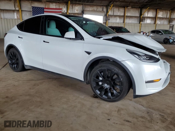 2021 Tesla Model Y Long Range with VIN 5YJYGDEE6MF075819, listed as a Copart auction lot 50903425 with 67,857 mi miles and Salvage Title. Bid and sale history available at DreamBid. Image 4.