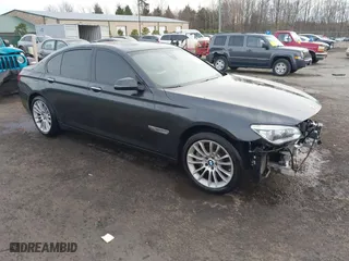 2015 BMW 7 Series 750i xDrive with VIN WBAYB6C56FG299238, listed as a IAAI auction lot 41441393 with 62,396 mi miles. Bid and sale history available at carsss.com. Image 1.