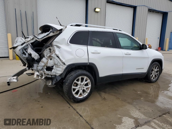 2015 Jeep Cherokee Latitude with VIN 1C4PJLCB9FW532301, listed as a Copart auction lot 52379335 with 153,845 mi miles and Salvage Title. Bid and sale history available at DreamBid. Image 3.