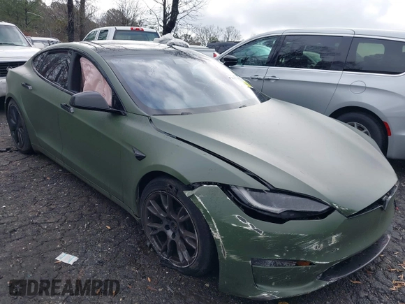 2022 Tesla Model S with VIN 5YJSA1E50NF487306, listed as a IAAI auction lot 41570528 with Not Provided miles and . Bid and sale history available at DreamBid. Image 1.