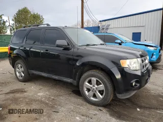 2011 Ford Escape XLT with VIN 1FMCU0D76BKB22633, listed as a Copart auction lot 52345405 with 134,266 mi miles and Clean Title. Bid and sale history available at carsss.com. Image 4.