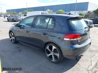 2013 Volkswagen GTI with VIN WVWHD7AJ2DW132851, listed as a IAAI auction lot 42021650 with 83,473 mi miles. Bid and sale history available at carsss.com. Image 3.