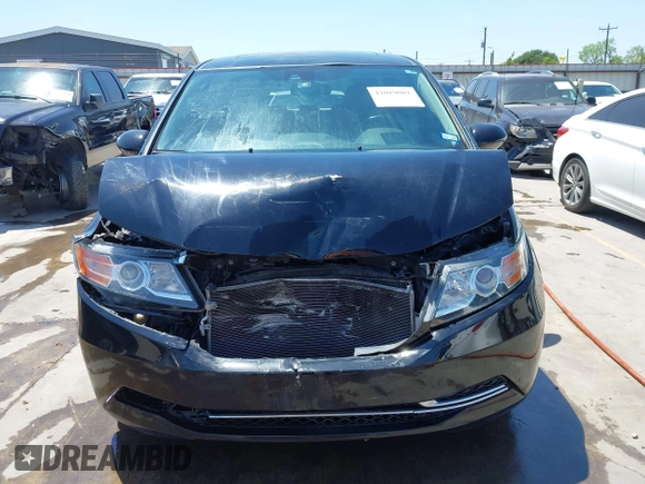 2016 Honda Odyssey EX-L with VIN 5FNRL5H61GB089853, listed as a IAAI auction lot 42019081 with 81,317 mi miles and . Bid and sale history available at DreamBid. Image 13.
