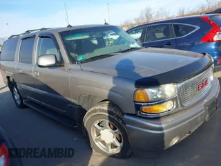 2003 GMC Yukon XL Denali with VIN 1GKFK66UX3J187686, listed as a IAAI auction lot 41474419 with 169,249 mi miles. Bid and sale history available at carsss.com. Image 1.