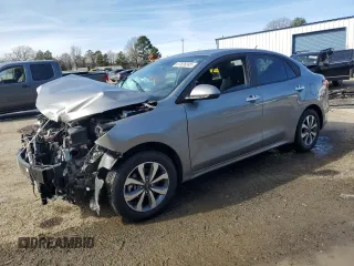 2022 Kia Rio LX with VIN 3KPA24AD4NE464172, listed as a Copart auction lot 87828245 with 63,796 mi miles and Salvage Title. Bid and sale history available at carsss.com. Image 1.