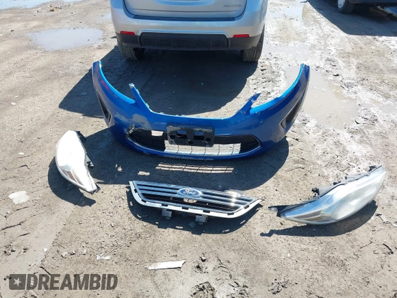 2011 Ford Fiesta SE z VIN 3FADP4BJXBM175601, wystawiony jako IAAI lot #42282031 z przebiegiem 157 658 mil mil oraz . Historia ofert i sprzedaży dostępna na DreamBid. Obrazek 12.
