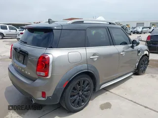 2018 MINI Countryman Cooper S with VIN WMZYT3C3XJ3E00006, listed as a IAAI auction lot 42420388 with 117,313 mi miles and . Bid and sale history available at DreamBid. Image 4.