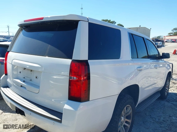 2017 Chevrolet Tahoe Commercial with VIN 1GNSKFEC8HR216301, listed as a IAAI auction lot 41602286 with 160,619 mi miles. Bid and sale history available at carsss.com. Image 4.
