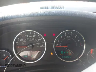 2012 Jeep Wrangler Sport with VIN 1C4AJWAG0CL128595, listed as a IAAI auction lot 42048590 with 133,085 mi miles and . Bid and sale history available at DreamBid. Image 7.