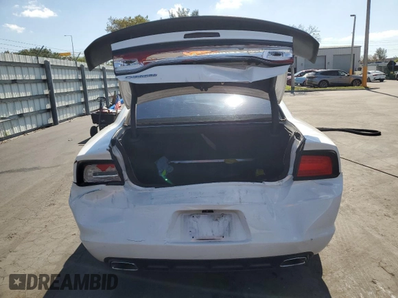 2013 Dodge Charger SE with VIN 2C3CDXBG8DH677551, listed as a Copart auction lot 53260735 with 124,248 mi miles and Salvage Title. Bid and sale history available at DreamBid. Image 6.