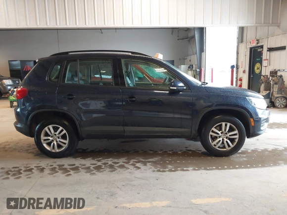 2016 Volkswagen Tiguan S with VIN WVGBV7AXXGW565289, listed as a IAAI auction lot 42113317 with 83,537 mi miles and . Bid and sale history available at DreamBid. Image 13.
