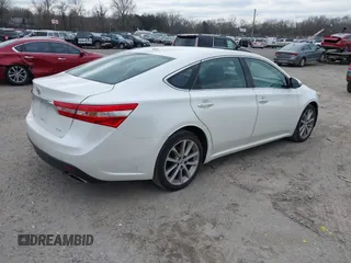 2014 Toyota Avalon Limited with VIN 4T1BK1EB8EU081201, listed as a IAAI auction lot 41624523 with 196,217 mi miles. Bid and sale history available at carsss.com. Image 4.