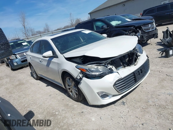2014 Toyota Avalon Limited z VIN 4T1BK1EB9EU126369, wystawiony jako IAAI lot #41860590 z przebiegiem 135 259 mil mil oraz . Historia ofert i sprzedaży dostępna na DreamBid. Obrazek 1.