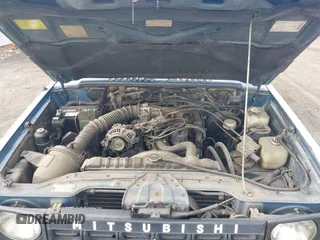 1991 Mitsubishi Montero z VIN JA4GJ31S0MJ006906, wystawiony jako IAAI lot #41782268 z przebiegiem 184 605 mil mil oraz . Historia ofert i sprzedaży dostępna na DreamBid. Obrazek 10.