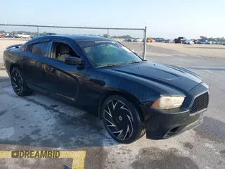 2013 Dodge Charger SE with VIN 2C3CDXBG5DH535058, listed as a IAAI auction lot 42101566 with 205,790 mi miles and . Bid and sale history available at carsss.com. Image 1.