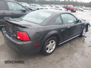 2004 Ford Mustang Standard z VIN 1FAFP40414F105171, wystawiony jako IAAI lot #41754232 z przebiegiem Nie podano mil oraz . Historia ofert i sprzedaży dostępna na DreamBid. Obrazek 4.
