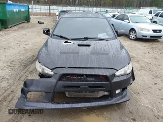 2010 Mitsubishi Lancer Evolution GSR with VIN JA32W8FV1AU012725, listed as a IAAI auction lot 41542629 with 124,347 mi miles and . Bid and sale history available at DreamBid. Image 6.