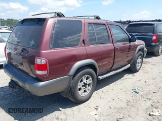 2001 Nissan Pathfinder SE z VIN JN8DR09Y21W584419, wystawiony jako IAAI lot #42133287 z przebiegiem 270 751 mil mil oraz . Historia ofert i sprzedaży dostępna na DreamBid. Obrazek 4.