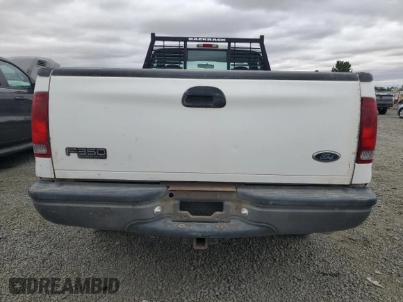 1999 Ford F-350 with VIN 1FTSF30L1XED35901, listed as a Copart auction lot 63499344 with 120,122 mi miles and Salvage title. Bid and sale history available at DreamBid. Image 6.