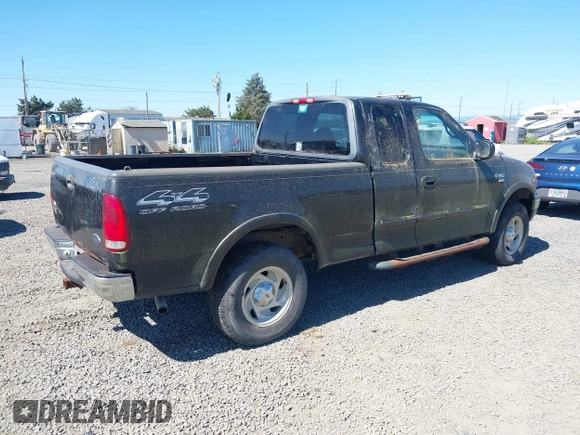 2000 Ford F-150 XL z VIN 1FTRX18L6YKB06492, wystawiony jako IAAI lot #42058110 z przebiegiem 169 217 mil mil oraz . Historia ofert i sprzedaży dostępna na DreamBid. Obrazek 4.
