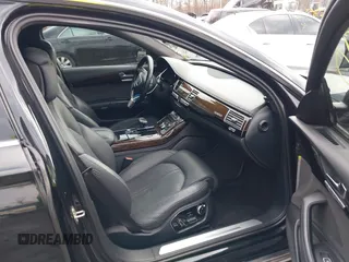 2012 Audi A8 L with VIN WAURVAFD8CN006917, listed as a IAAI auction lot 40877090 with 144,387 mi miles. Bid and sale history available at carsss.com. Image 5.