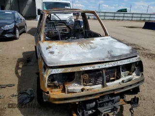 1992 Geo Tracker z VIN 2CNBJ18U5N6929792, wystawiony jako Copart lot #68870474 z przebiegiem Nie podano mil oraz Nie do naprawy. Historia ofert i sprzedaży dostępna na DreamBid. Obrazek 5.