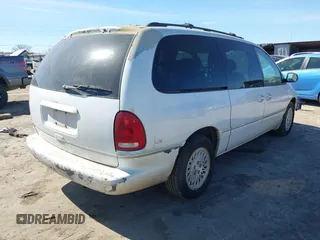 1997 Chrysler Town & Country LXi with VIN 1C4GP54L4VB200600, listed as a IAAI auction lot 41688074 with 1 mi miles. Bid and sale history available at carsss.com. Image 4.