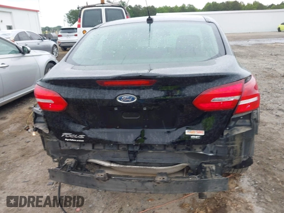 2018 Ford Focus SE with VIN 1FADP3F2XJL206441, listed as a IAAI auction lot 42341641 with 189,260 mi miles and . Bid and sale history available at DreamBid. Image 17.