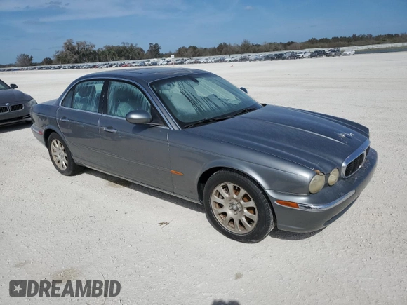 2004 Jaguar XJ 8 with VIN SAJWA71C84SG17802, listed as a Copart auction lot 76880914 with Not Provided miles and Non Repairable. Bid and sale history available at DreamBid. Image 4.
