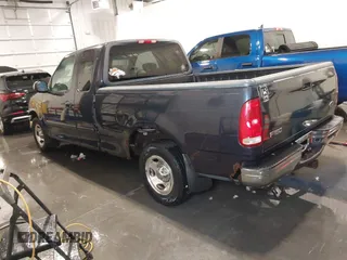 2001 Ford F-150 XL z VIN 1FTRX17L61NB44147, wystawiony jako IAAI lot #41464804 z przebiegiem 130 860 mil mil oraz . Historia ofert i sprzedaży dostępna na DreamBid. Obrazek 3.