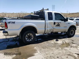 2001 Ford F-250 XL with VIN 1FTNX21F11ED05348, listed as a Copart auction lot 52098155 with 217,678 mi miles and Salvage Title. Bid and sale history available at DreamBid. Image 3.
