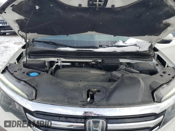 2018 Honda Pilot Touring z VIN 5FNYF6H99JB028034, wystawiony jako Copart lot #45143085 z przebiegiem 70 060 mil mil oraz Szkoda całkowita • Salvage title. Historia ofert i sprzedaży dostępna na DreamBid. Obrazek 12.