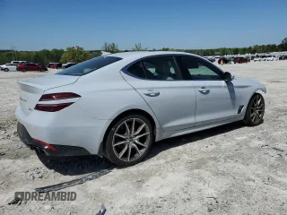 2022 Genesis G70 2.0T z VIN KMTG34TA0NU089619, wystawiony jako Copart lot #52154495 z przebiegiem 70 890 mil mil oraz Szkody całkowita. Historia ofert i sprzedaży dostępna na DreamBid. Obrazek 3.