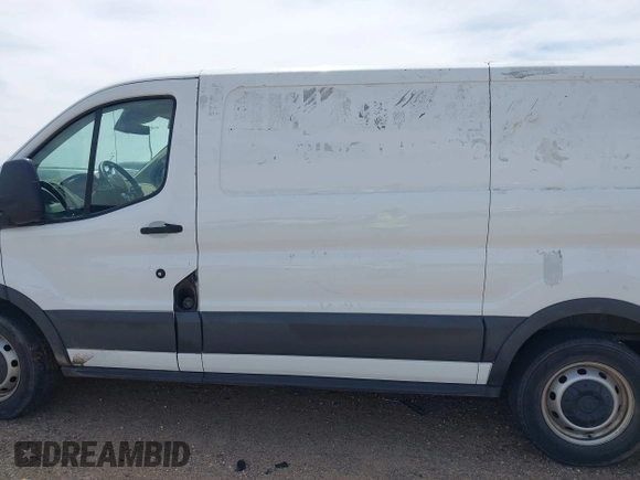 2018 Ford Transit Cargo with VIN 1FTYE1YG4JKA25467, listed as a IAAI auction lot 41738700 with 198,126 mi miles and . Bid and sale history available at DreamBid. Image 14.