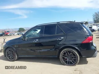 2016 Mercedes-Benz GLE 63 S AMG with VIN 4JGDA7FBXGA665133, listed as a IAAI auction lot 41634945 with 105,800 mi miles and . Bid and sale history available at DreamBid. Image 14.