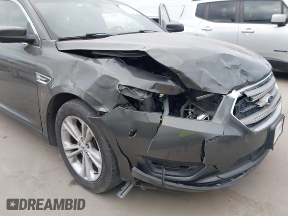 2015 Ford Taurus SEL with VIN 1FAHP2E8XFG161616, listed as a IAAI auction lot 42049199 with 138,565 mi miles and . Bid and sale history available at carsss.com. Image 6.