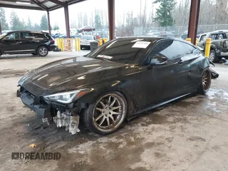 2017 Infiniti Q60 Sport with VIN JN1EV7EK5HM360687, listed as a IAAI auction lot 41243501 with 103,027 mi miles and . Bid and sale history available at DreamBid. Image 2.