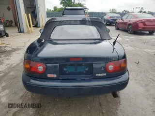 1996 Mazda MX-5 Miata z VIN JM1NA3531T0718068, wystawiony jako Copart lot #56614065 z przebiegiem 116 486 mil mil oraz Szkody całkowita. Historia ofert i sprzedaży dostępna na DreamBid. Obrazek 6.