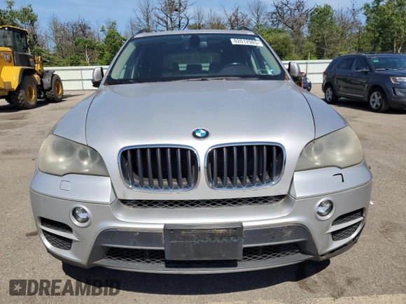 2012 BMW X5 35i with VIN 5UXZV4C5XCL749204, listed as a Copart auction lot 62012985 with 94,636 mi miles and Clean title. Bid and sale history available at DreamBid. Image 5.