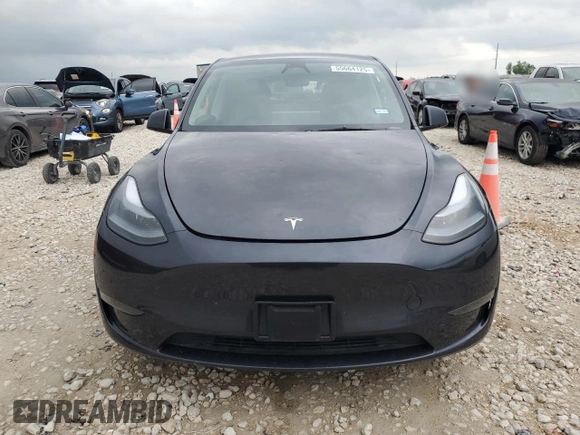 2024 Tesla Model Y with VIN 7SAYGDEDXRA322676, listed as a Copart auction lot 55664125 with 8,788 mi miles and Clean title. Bid and sale history available at DreamBid. Image 5.