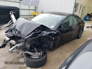 2022 Tesla Model 3 with VIN 5YJ3E1EA6NF188263, listed as a Copart auction lot 77542203 with 75,461 mi miles and Non Repairable. Bid and sale history available at DreamBid. Image 1.