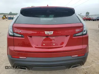 2021 Cadillac XT4 FWD Sport with VIN 1GYFZER49MF082391, listed as a Copart auction lot 56256804 with 24,415 mi miles and Salvage Title. Bid and sale history available at DreamBid. Image 6.