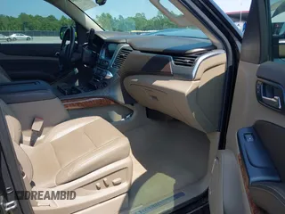 2019 Chevrolet Suburban LT with VIN 1GNSCJKC5KR304766, listed as a IAAI auction lot 42410264 with 105,171 mi miles and . Bid and sale history available at DreamBid. Image 5.