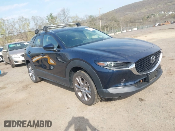 2021 Mazda CX-30 Premium with VIN 3MVDMBDM4MM238367, listed as a IAAI auction lot 42124335 with 31,120 mi miles and . Bid and sale history available at DreamBid. Image 1.