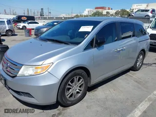 2012 Honda Odyssey EX with VIN 5FNRL5H48CB023003, listed as a IAAI auction lot 41975027 with 221,313 mi miles. Bid and sale history available at carsss.com. Image 2.