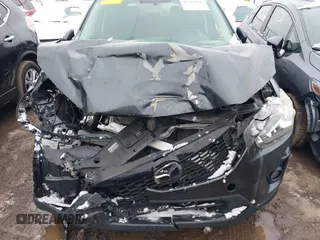 2014 Mazda CX-5 Touring with VIN JM3KE2CY2E0407453, listed as a IAAI auction lot 41564916 with 104,852 mi miles. Bid and sale history available at carsss.com. Image 6.