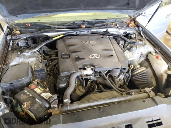 2002 Infiniti Q45 z VIN JNKBF01A62M002926, wystawiony jako Copart lot #73206924 z przebiegiem Nie podano mil oraz Szkoda całkowita • Salvage title. Historia ofert i sprzedaży dostępna na DreamBid. Obrazek 11.