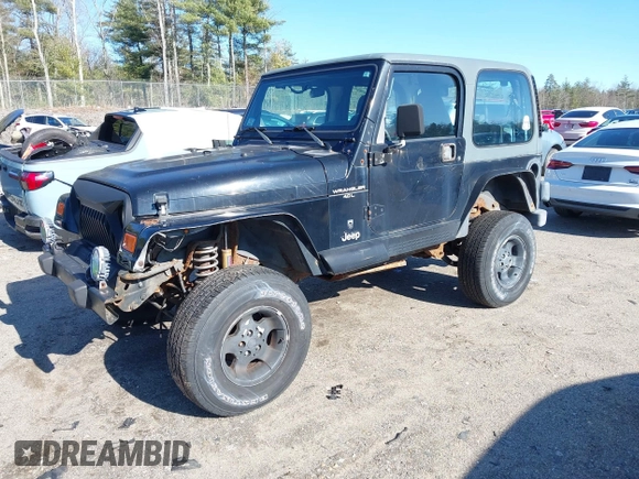 2001 Jeep Wrangler Sport with VIN 1J4FA49S61P357348, listed as a IAAI auction lot 41938170 with 177,356 mi miles. Bid and sale history available at carsss.com. Image 2.