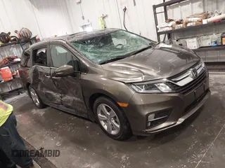2019 Honda Odyssey EX-L with VIN 5FNRL6H73KB135075, listed as a IAAI auction lot 41908515 with 61,426 mi miles. Bid and sale history available at carsss.com. Image 1.